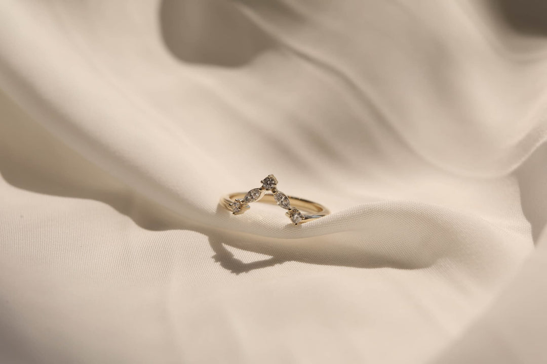 0.20 TCW Marquise & Round Curved Diamond Wedding Band