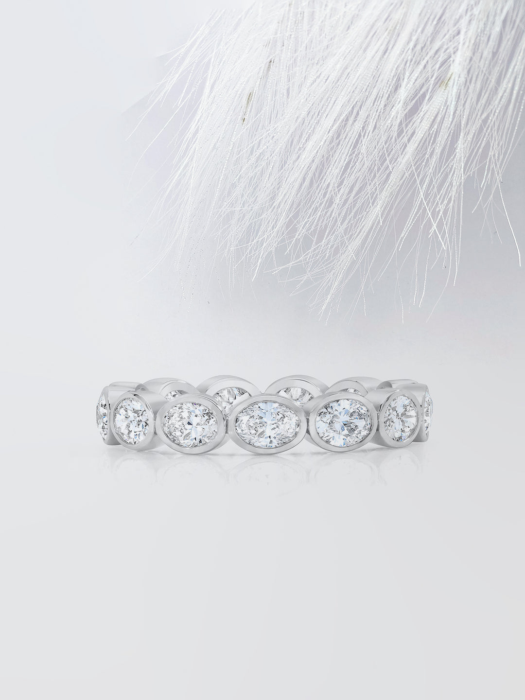 Oval Cut Bezel Diamond Wedding Band For Women