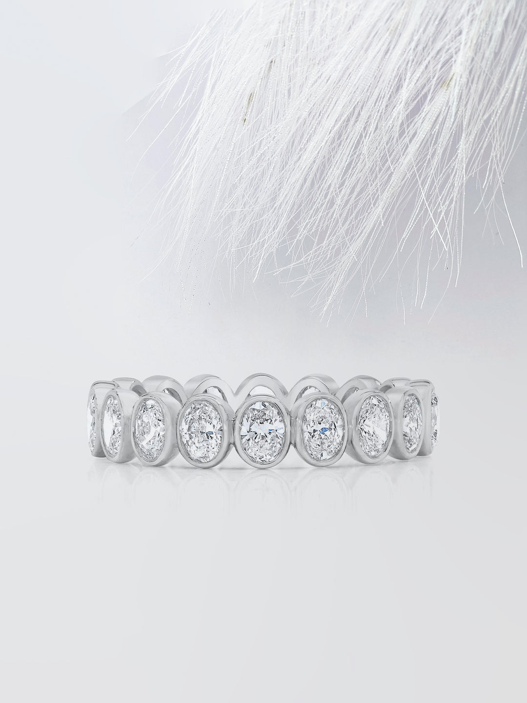 Oval Cut Bezel Diamond Wedding Band For Women