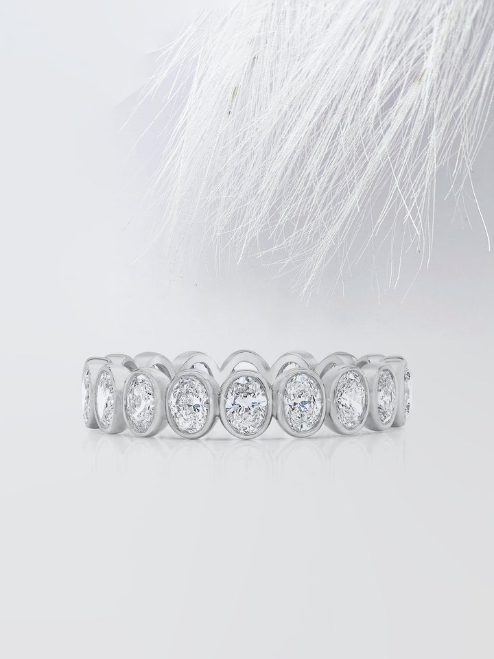Oval Cut Bezel Diamond Wedding Band For Women