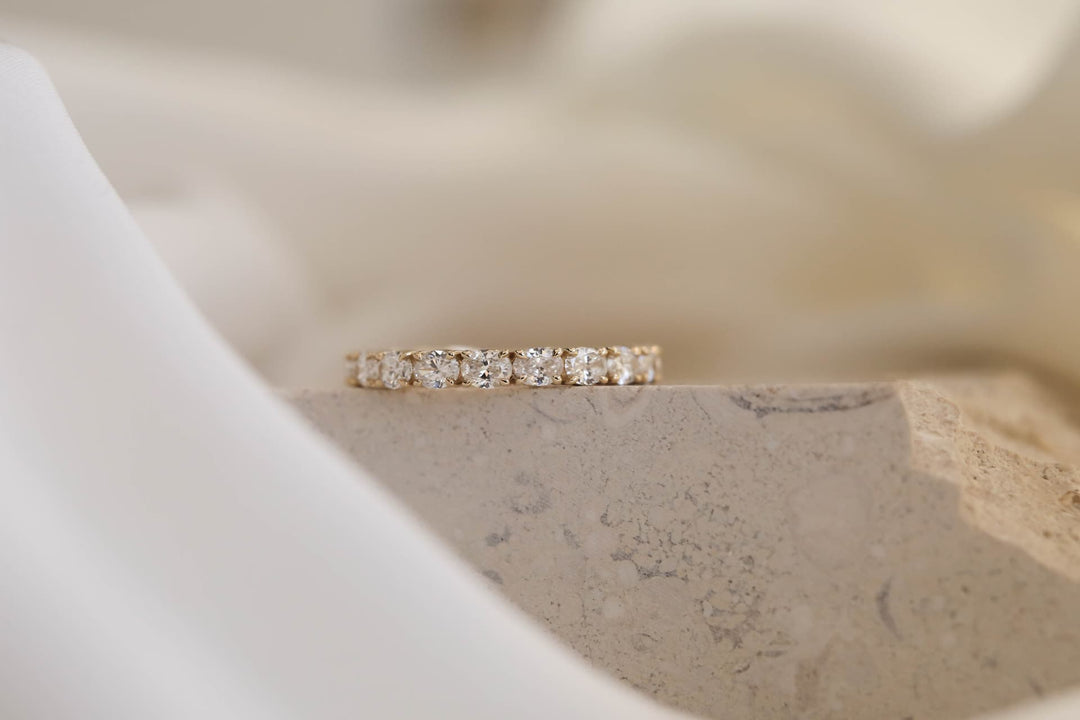0.70 TCW Oval Semi Eternity Diamond Wedding Band