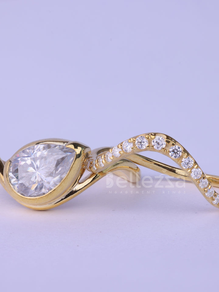 Unique Pear Cut Diamond Curved Moissanite Engagement Ring Set