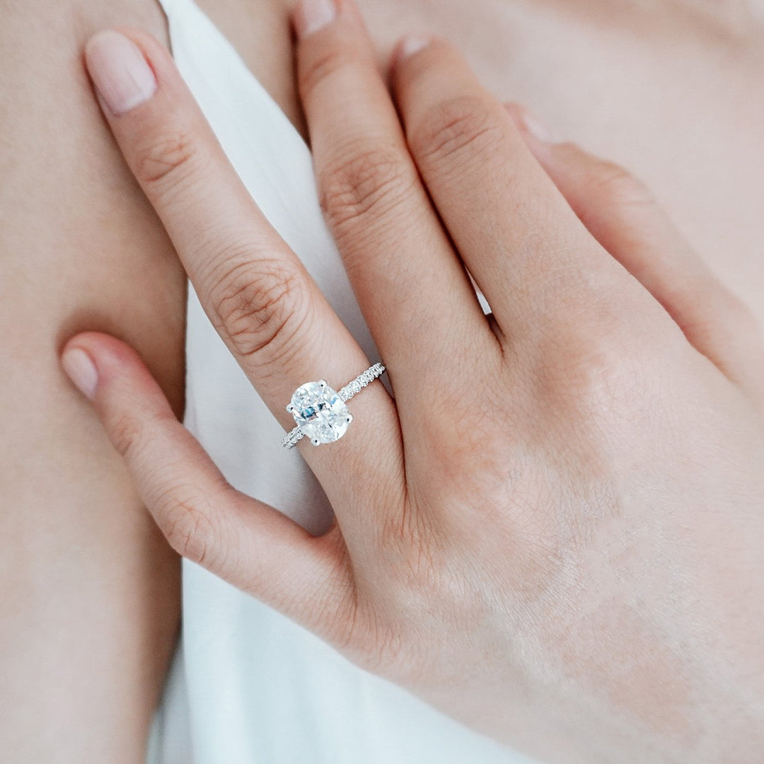 2-50-ct-oval-shaped-moissanite-hidden-halo-engagement-ring-3