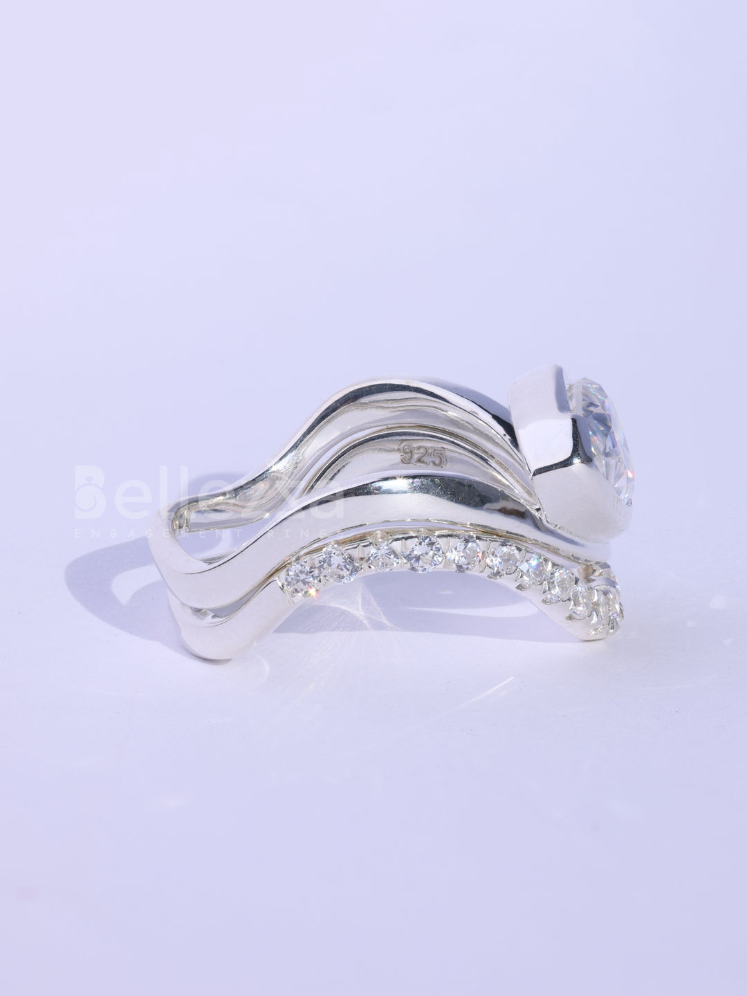 Pear Cut Unique Curved Moissanite Pave Set Engagement Ring Set