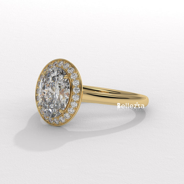 YELLOW GOLD OVAL CUT RING