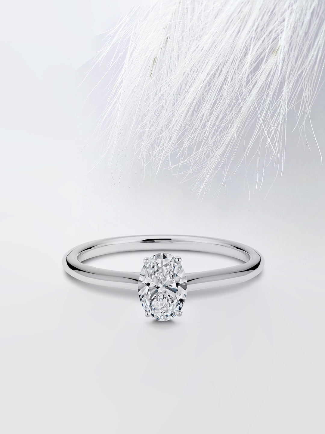 0.75CT Oval Cut Solitaire Moissanite Diamond Engagement Ring in White Gold