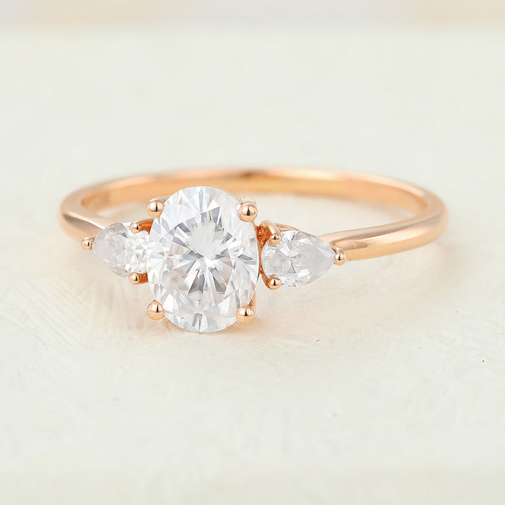 oval-shaped-moissanite-three-stone-engagement-ring