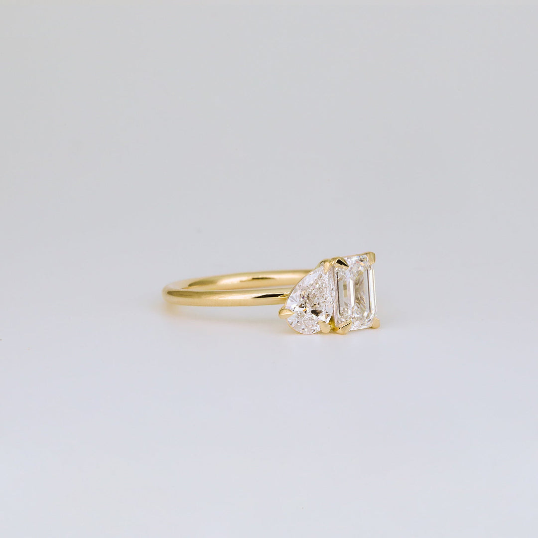1.47 TCW Emerald & Pear Diamond Two Stone Engagement Ring
