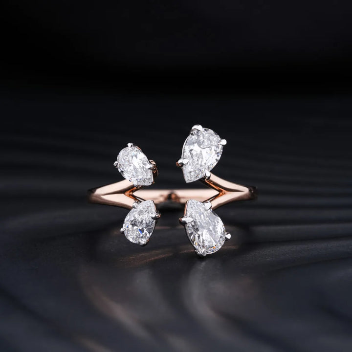 0.75 CT Pear Shaped Moissanite Four Stone Engagement Ring