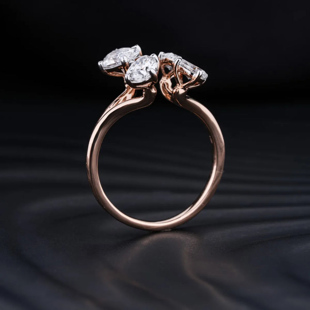 0.75 CT Pear Shaped Moissanite Four Stone Engagement Ring