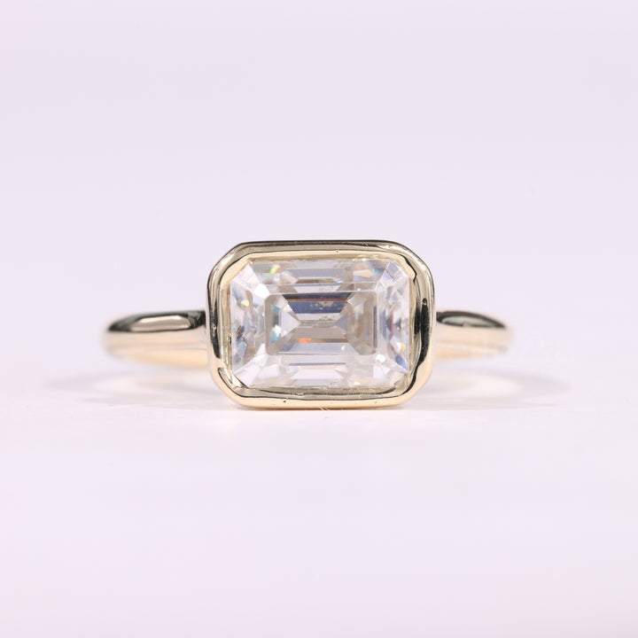 1.50CT East-West Emerald Cut Bezel Setting Moissanite Solitaire Ring