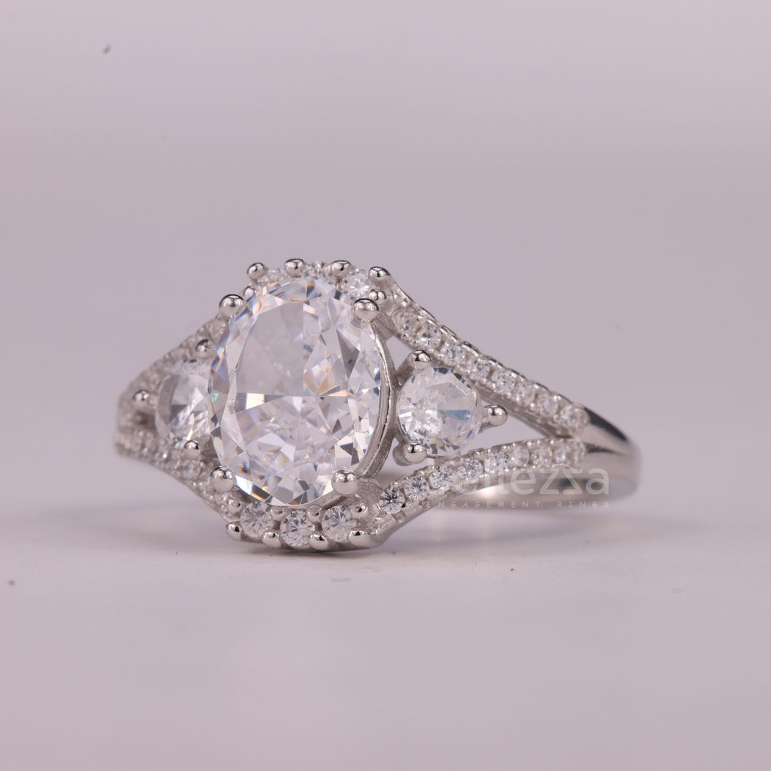 1.0CT Oval Cut Three Stone Split Shank Pave Set Engagement Ring