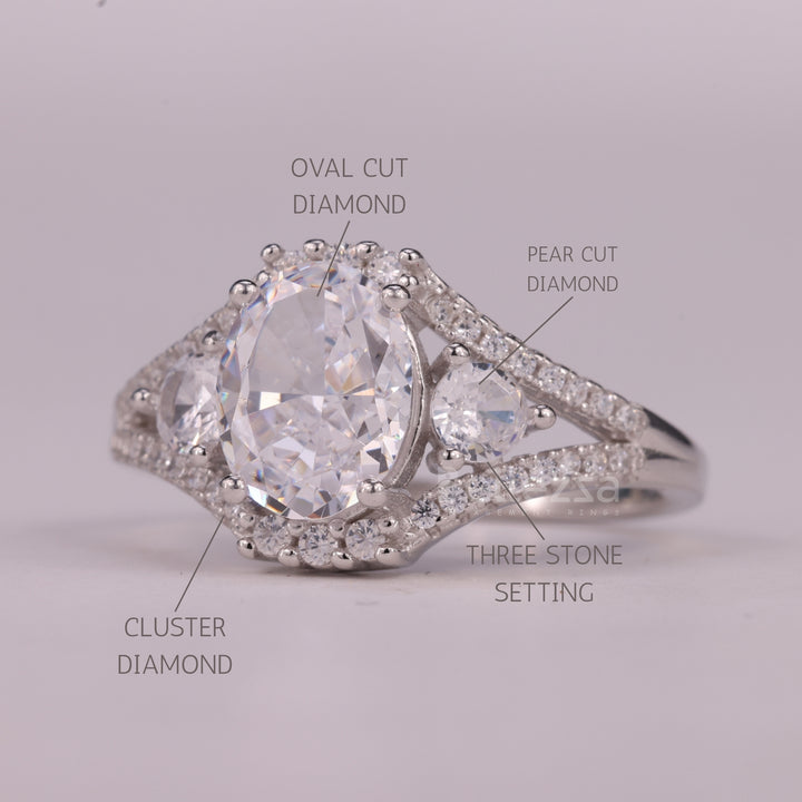 1.0CT Oval Cut Three Stone Split Shank Pave Set Engagement Ring
