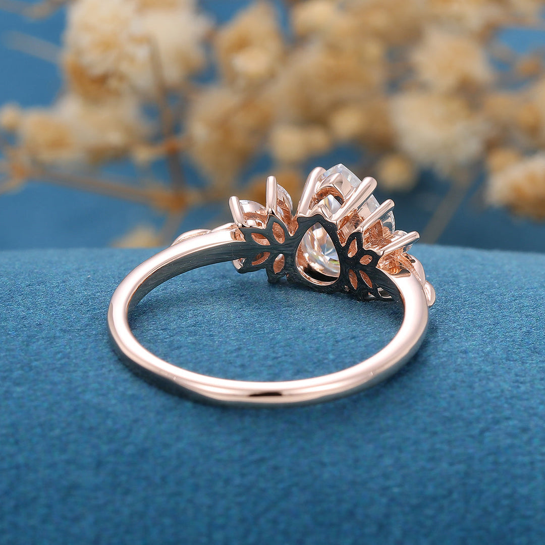 1-0-ct-pear-shape-moissanite-cluster-engagement-ring