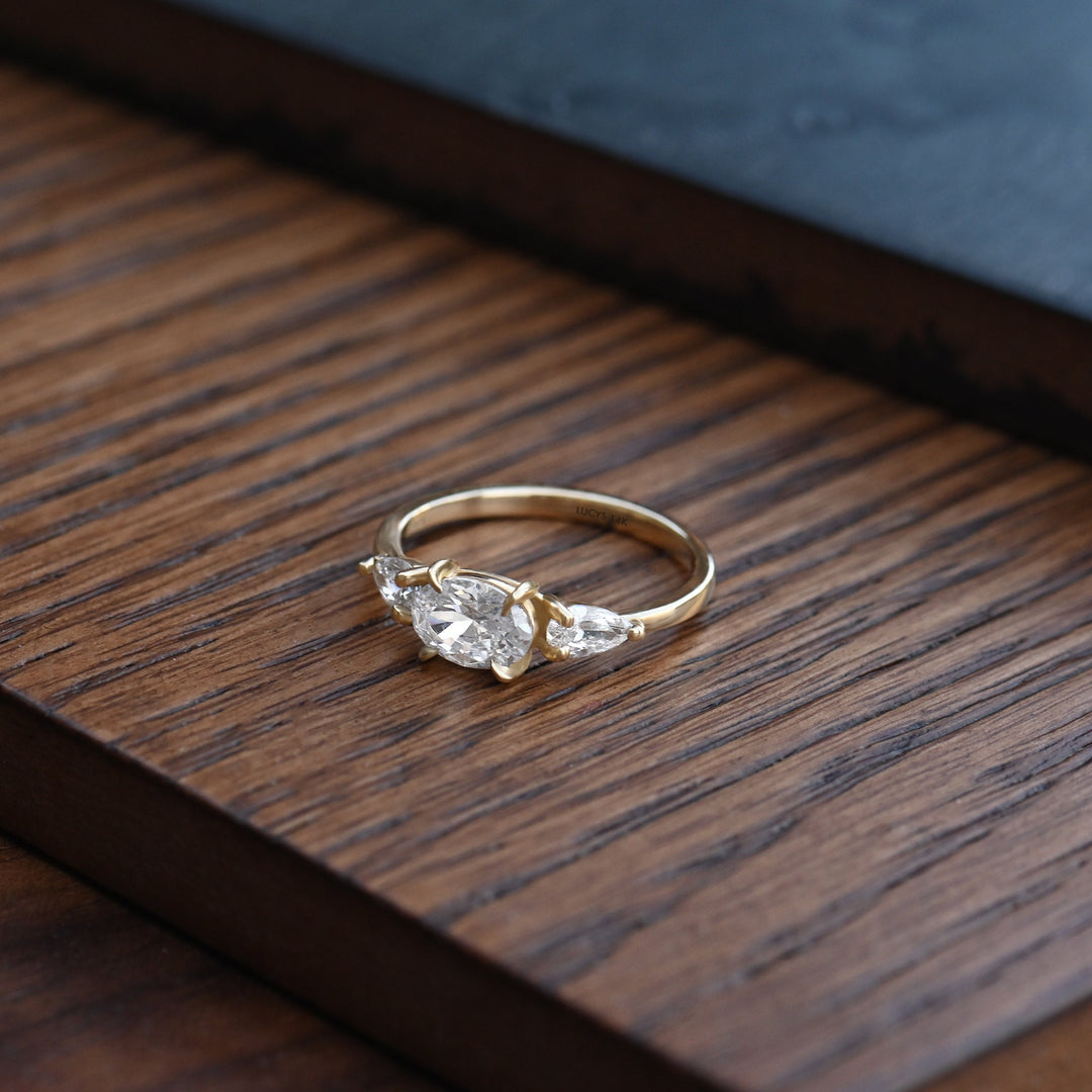 East-West Oval Cut Three Stone Moissanite Engagement Ring For Women