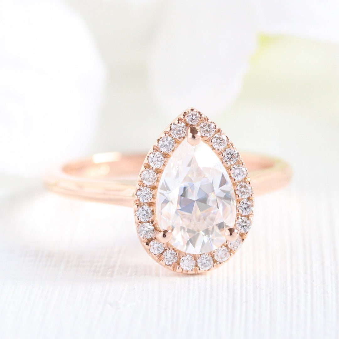 Pear Cut Moissanite Ring With Scalloped Diamond Band