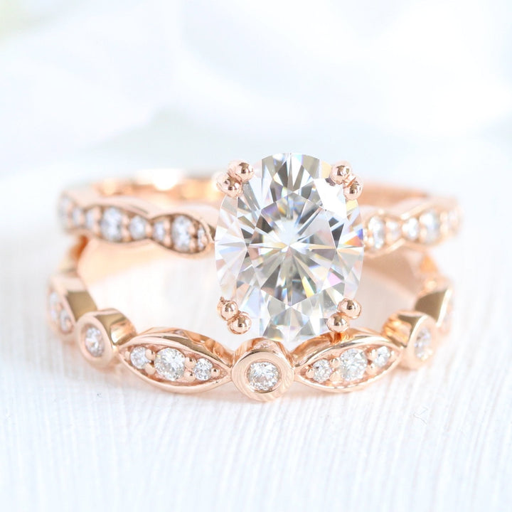 2.0ct Oval Moissanite Double Claw Ring with Matching Wedding Band