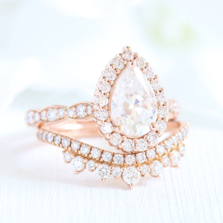 1.50ct Pear Cut Moissanite Halo Ring With Crown Diamond Band