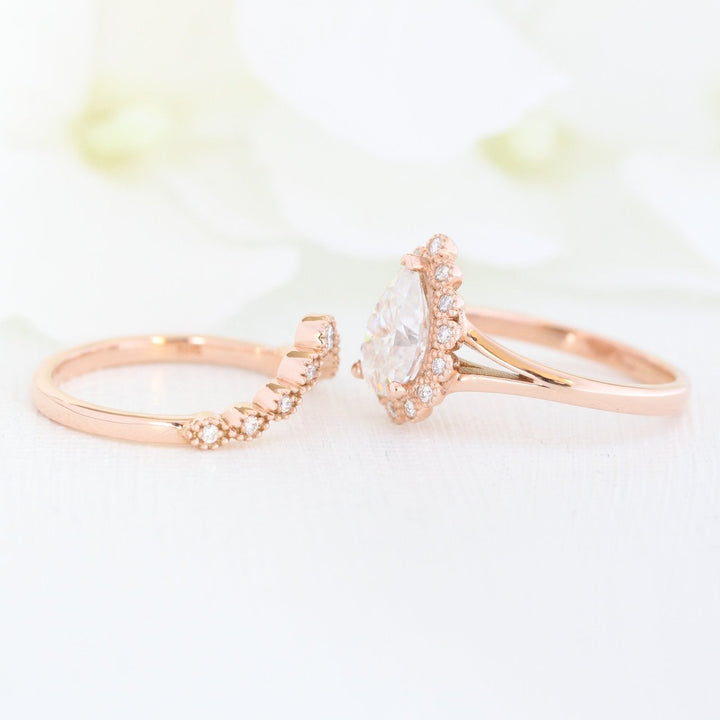 Pear Cut Moissanite Ring With Curve Halo Diamond Band