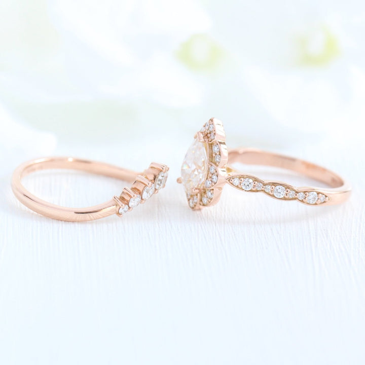 Pear Cut Moissanite Ring With Curve Diamond Band