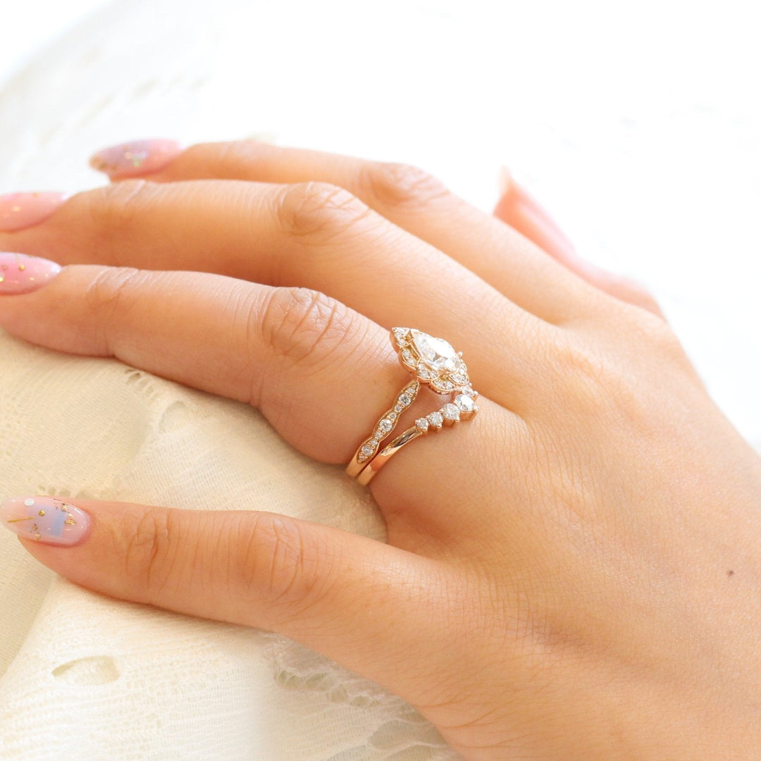 Pear Cut Moissanite Ring With Curve Diamond Band