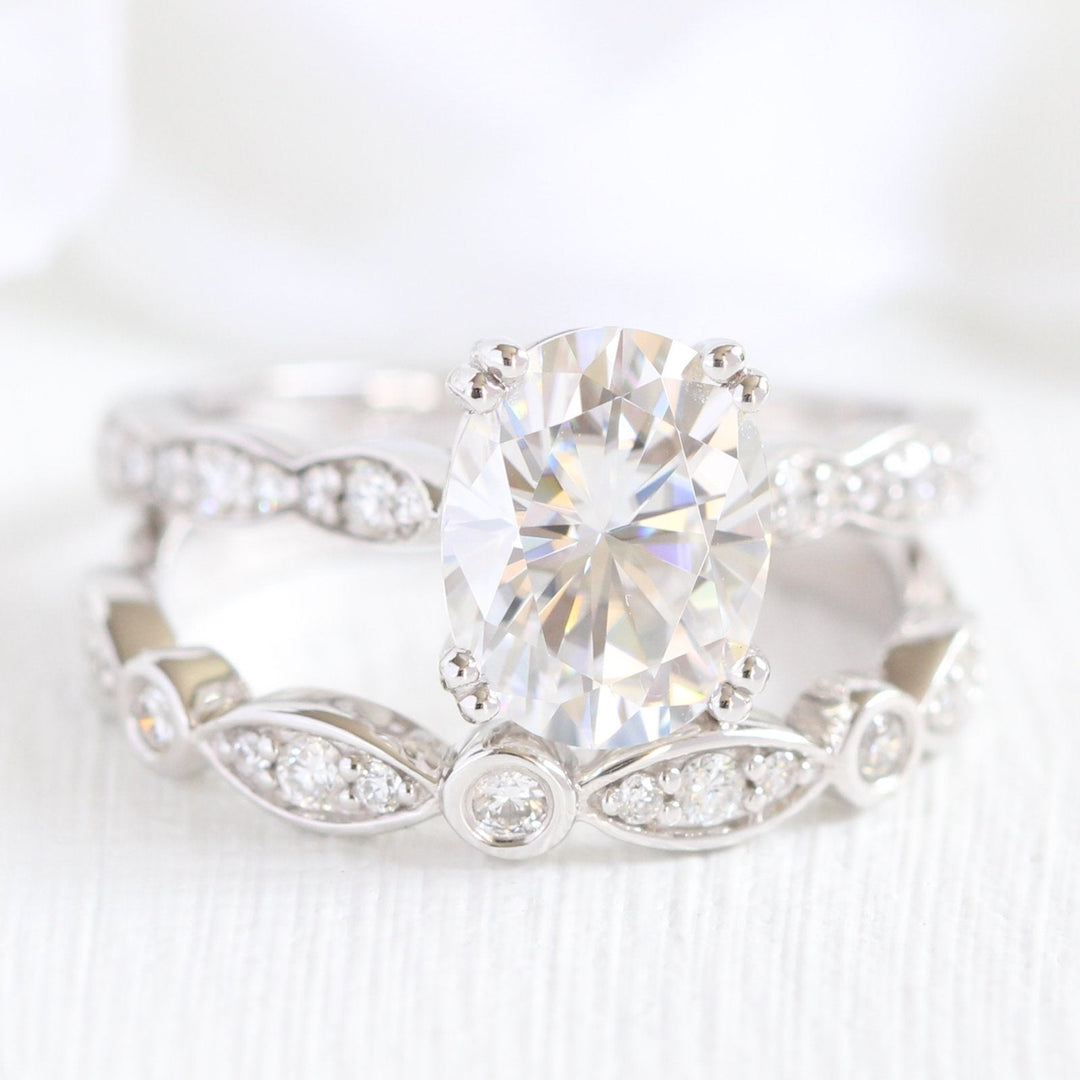 2.0ct Oval Moissanite Double Claw Ring with Matching Wedding Band