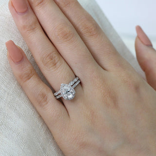 Pear Cut Moissanite Ring With Diamond Band
