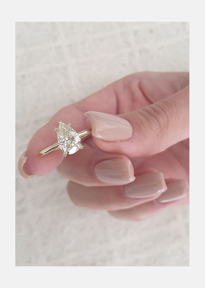 1.31ct Pear Cut Solitaire Moissanite Diamond Engagement Ring