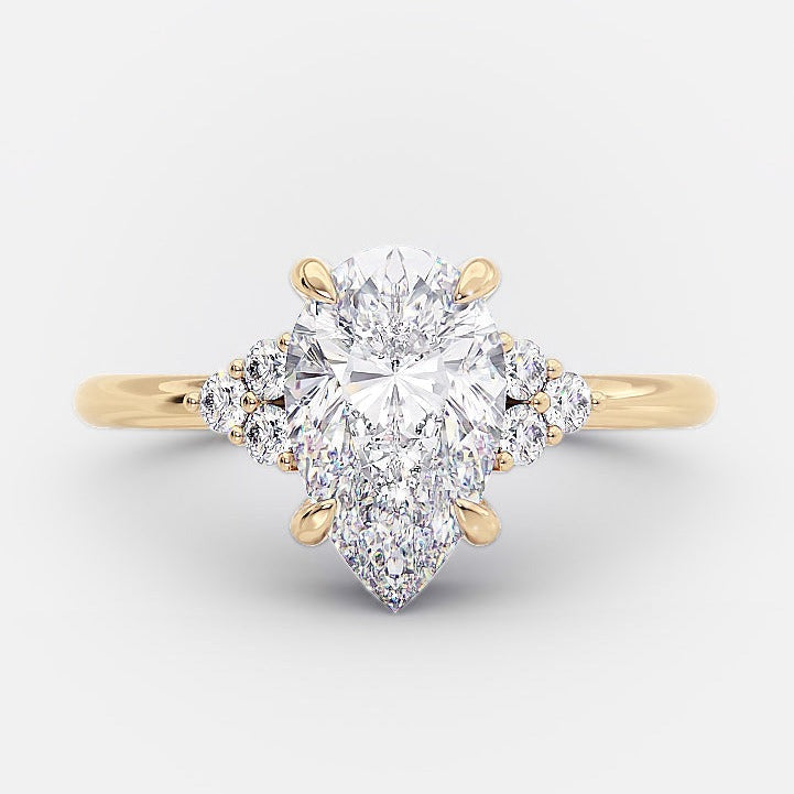 Pear Cut Cluster Moissanite Diamond Engagement Ring in 14K Yellow Gold